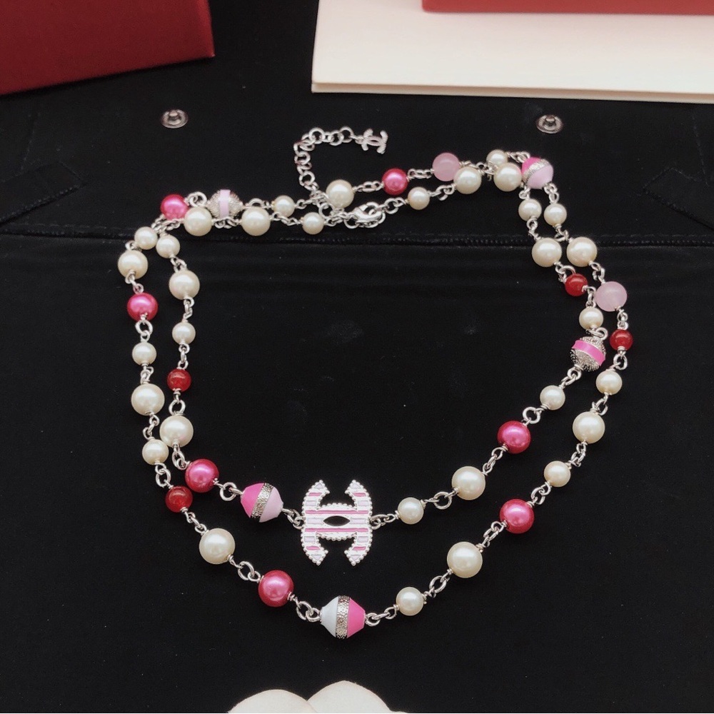 Double-Strand Pink and White Beaded Necklace with Silver-Tone Logo Accent